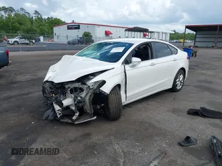 2013 Ford Fusion SE with VIN 3FA6P0H71DR241794, listed as a IAAI auction lot 42469017 with 154,627 mi miles and . Bid and sale history available at DreamBid. Image 2.