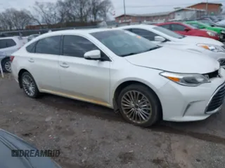 2016 Toyota Avalon Limited with VIN 4T1BK1EB6GU201211, listed as a IAAI auction lot 41599051 with 211,533 mi miles and . Bid and sale history available at carsss.com. Image 13.