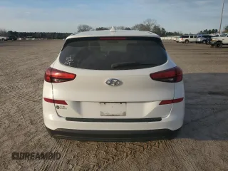 2019 Hyundai Tucson SE with VIN KM8J23A46KU031522, listed as a Copart auction lot 45322715 with 77,491 mi miles and Salvage Title. Bid and sale history available at carsss.com. Image 6.