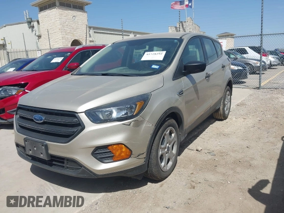 2018 Ford Escape S with VIN 1FMCU0F75JUB72536, listed as a IAAI auction lot 41728292 with 115,971 mi miles and . Bid and sale history available at DreamBid. Image 2.