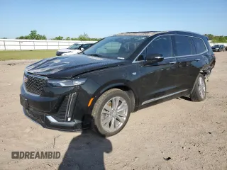 2024 Cadillac XT6 FWD Premium Luxury z VIN 1GYKPCRS7RZ709179, wystawiony jako Copart lot #52251305 z przebiegiem Nie podano mil oraz Szkoda całkowita • Salvage title. Historia ofert i sprzedaży dostępna na DreamBid. Obrazek 1.