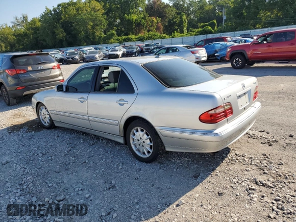 2002 Mercedes-Benz E-Class with VIN WDBJF82J42X077731, listed as a Copart auction lot 70280584 with 169,018 mi miles and Salvage Title. Bid and sale history available at carsss.com. Image 2.
