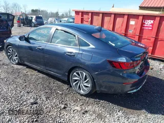 2020 Honda Insight Touring with VIN 19XZE4F90LE005829, listed as a IAAI auction lot 41531631 with 29,758 mi miles and . Bid and sale history available at carsss.com. Image 3.