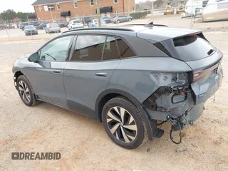 2023 Volkswagen ID.4 Pro z VIN 1V2DNPE85PC048594, wystawiony jako IAAI lot #41760977 z przebiegiem 623 mil mil oraz . Historia ofert i sprzedaży dostępna na DreamBid. Obrazek 3.