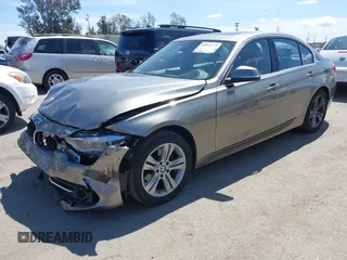 2018 BMW 3 Series 330i with VIN WBA8B9G58JNU98341, listed as a IAAI auction lot 41909777 with 85,396 mi miles and . Bid and sale history available at DreamBid. Image 2.