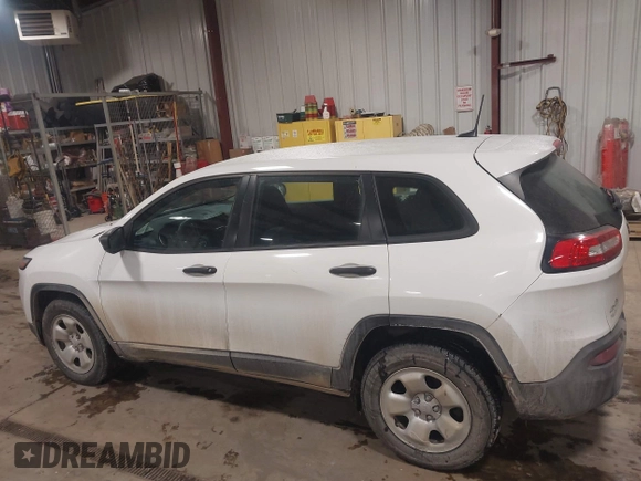 2016 Jeep Cherokee Sport with VIN 1C4PJMAS0GW254799, listed as a IAAI auction lot 41582436 with 140,471 mi miles and . Bid and sale history available at DreamBid. Image 14.