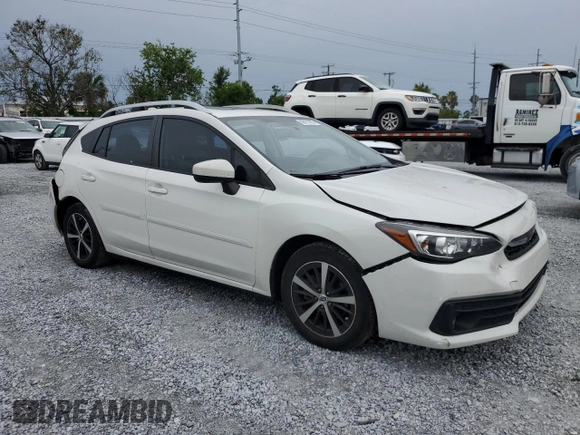 2022 Subaru Impreza Premium with VIN 4S3GTAD66N3710522, listed as a Copart auction lot 59011985 with 42,962 mi miles and Salvage title. Bid and sale history available at DreamBid. Image 4.