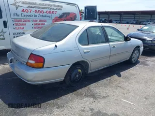 1999 Nissan Altima XE with VIN 1N4DL01D7XC181770, listed as a IAAI auction lot 41747919 with 197,601 mi miles. Bid and sale history available at carsss.com. Image 4.