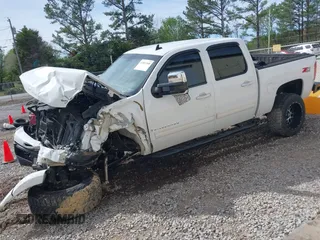 2009 Chevrolet Silverado 1500 LTZ with VIN 3GCEK33M19G162955, listed as a IAAI auction lot 41851348 with 203,553 mi miles and . Bid and sale history available at DreamBid. Image 2.