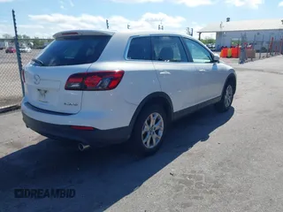 2015 Mazda CX-9 Sport with VIN JM3TB2BV3F0455632, listed as a IAAI auction lot 41881026 with 102,201 mi miles and . Bid and sale history available at carsss.com. Image 4.