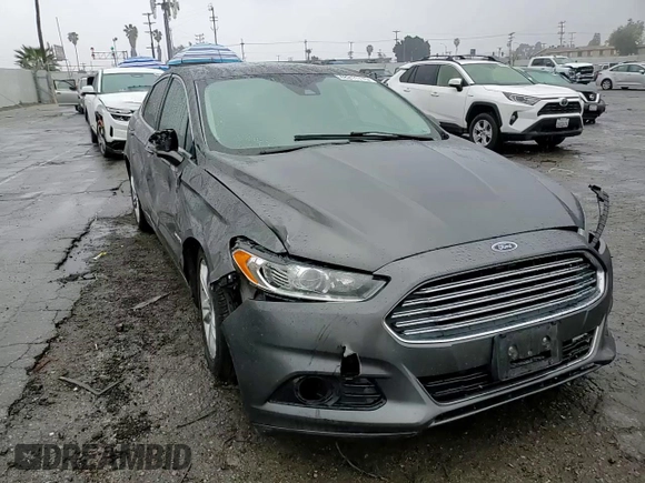 2016 Ford Fusion Titanium Hybrid z VIN 3FA6P0RU5GR356987, wystawiony jako Copart lot #48211775 z przebiegiem 145 192 mil mil oraz Szkoda całkowita • Salvage title. Historia ofert i sprzedaży dostępna na DreamBid. Obrazek 10.