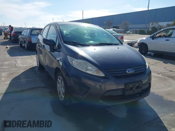 2012 Ford Fiesta S with VIN 3FADP4AJXCM187721, listed as a IAAI auction lot 41269984 with 118,474 mi miles. Bid and sale history available at carsss.com. Image 1.