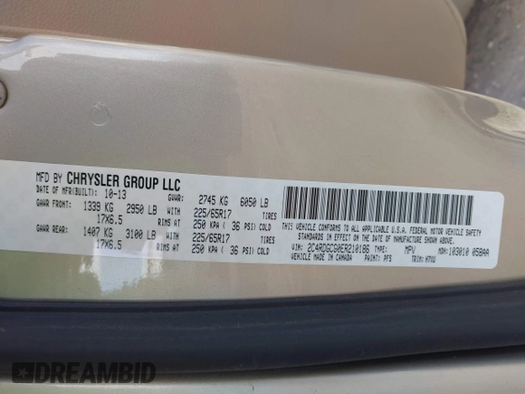 2014 Dodge Grand Caravan SXT with VIN 2C4RDGCG0ER210186, listed as a IAAI auction lot 40813319 with 100,230 mi miles and . Bid and sale history available at DreamBid. Image 9.