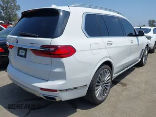 2019 BMW X7 xDrive50i z VIN 5UXCX4C54KLS38649, wystawiony jako IAAI lot #42435379 z przebiegiem 60 905 mil mil oraz . Historia ofert i sprzedaży dostępna na DreamBid. Obrazek 4.