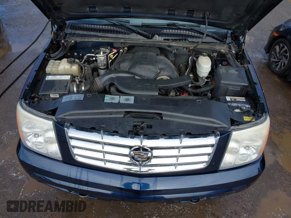 2006 Cadillac Escalade z VIN 1GYEK63N66R127117, wystawiony jako IAAI lot #41570716 z przebiegiem 126 637 mil mil oraz . Historia ofert i sprzedaży dostępna na DreamBid. Obrazek 10.
