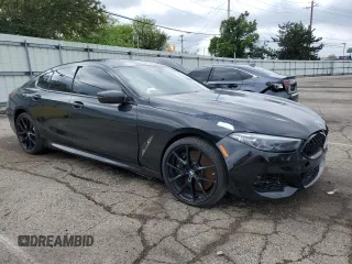 2022 BMW 8 Series M850i z VIN WBAGV8C02NCK08667, wystawiony jako Copart lot #55632805 z przebiegiem 22 737 mil mil oraz Szkody całkowita. Historia ofert i sprzedaży dostępna na DreamBid. Obrazek 4.