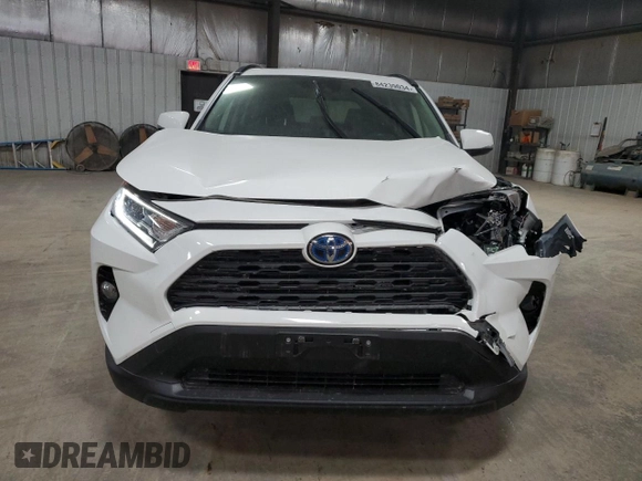 2021 Toyota RAV4 Hybrid XLE with VIN JTMRWRFV3MD127501, listed as a Copart auction lot 84239034 with 75,707 mi miles and Salvage Title. Bid and sale history available at carsss.com. Image 5.