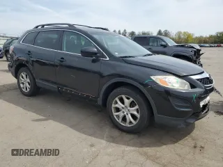 2011 Mazda CX-9 Sport with VIN JM3TB3BVXB0320390, listed as a Copart auction lot 53681995 with 125,829 mi miles and Salvage Title. Bid and sale history available at DreamBid. Image 4.