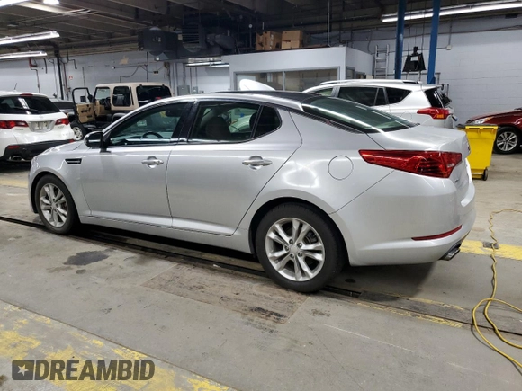 2013 Kia Optima EX with VIN 5XXGN4A77DG240895, listed as a Copart auction lot 54431955 with 28,060 mi miles and Clean title. Bid and sale history available at DreamBid. Image 2.