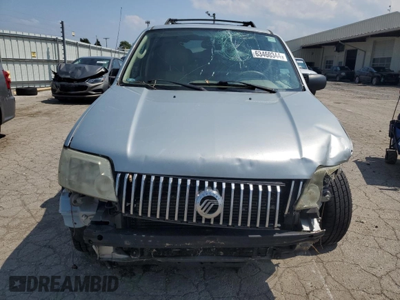2005 Mercury Mariner Luxury z VIN 4M2YU57155DJ28005, wystawiony jako Copart lot #63460344 z przebiegiem 131 531 mil mil oraz Szkody całkowita. Historia ofert i sprzedaży dostępna na DreamBid. Obrazek 5.