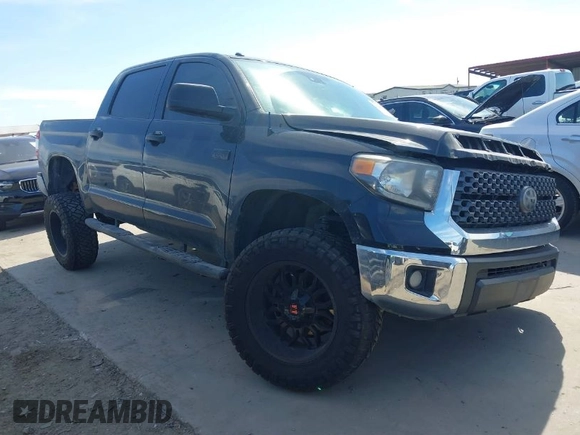 2018 Toyota Tundra SR5 z VIN 5TFDW5F12JX694518, wystawiony jako IAAI lot #41663831 z przebiegiem 183 220 mil mil oraz . Historia ofert i sprzedaży dostępna na DreamBid. Obrazek 1.