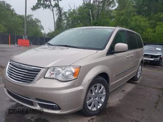 2014 Chrysler Town & Country Touring with VIN 2C4RC1BG7ER208937, listed as a IAAI auction lot 42213347 with 198,077 mi miles and . Bid and sale history available at DreamBid. Image 2.