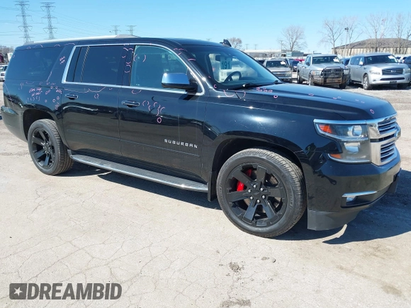 2017 Chevrolet Suburban Premier with VIN 1GNSKJKC8HR285321, listed as a IAAI auction lot 41796659 with 128,113 mi miles and . Bid and sale history available at DreamBid. Image 1.