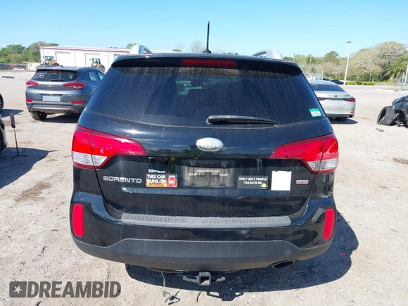 2014 Kia Sorento LX with VIN 5XYKT4A69EG468157, listed as a IAAI auction lot 41771810 with 144,214 mi miles. Bid and sale history available at carsss.com. Image 16.