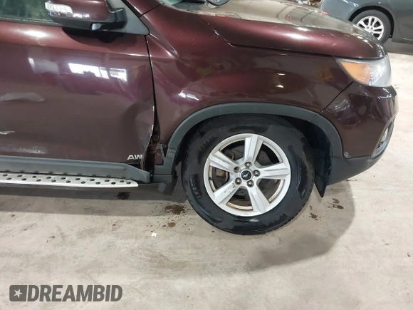2012 Kia Sorento LX with VIN 5XYKTCA66CG264679, listed as a IAAI auction lot 41742682 with 161,781 mi miles. Bid and sale history available at carsss.com. Image 6.