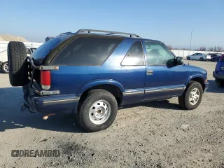 2000 Chevrolet Blazer LS z VIN 1GNCT18W8YK234090, wystawiony jako Copart lot #43063565 z przebiegiem 96 942 mil mil oraz Czysty tytuł • Clean title. Historia ofert i sprzedaży dostępna na DreamBid. Obrazek 3.