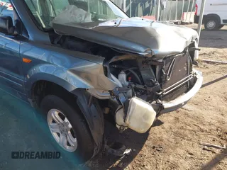 2006 Honda Pilot LX with VIN 2HKYF18156H542940, listed as a IAAI auction lot 41653949 with 152,321 mi miles and . Bid and sale history available at DreamBid. Image 18.