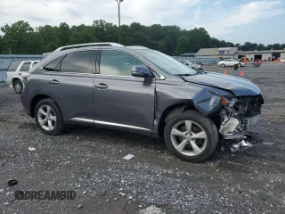 2012 Lexus RX 350 with VIN 2T2BK1BA5CC136824, listed as a Copart auction lot 63295785 with 133,803 mi miles and Salvage title. Bid and sale history available at DreamBid. Image 4.