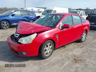 2008 Ford Focus SE with VIN 1FAHP35N58W219099, listed as a IAAI auction lot 42059347 with 209,309 mi miles. Bid and sale history available at carsss.com. Image 2.