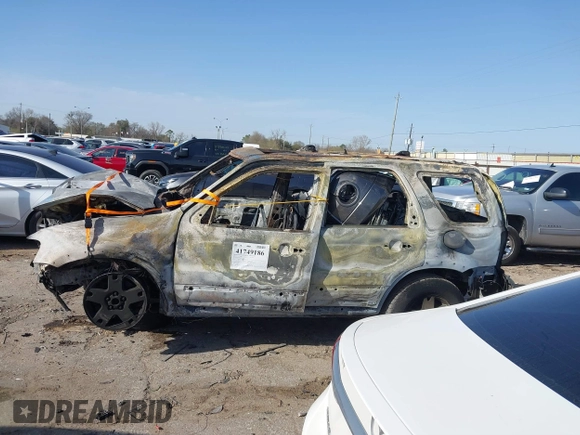 2005 Ford Escape Limited с VIN 1FMYU94105KA90031, выставлен на аукционе IAAI как лот 41749186 с пробегом Не указан миль и . История ставок и продаж доступна на DreamBid. Изображение 13.