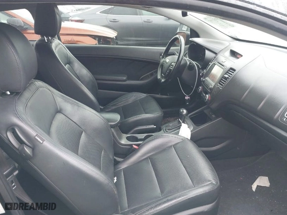 2016 Kia Forte Koup EX with VIN KNAFX6A89G5619980, listed as a IAAI auction lot 41611953 with 102900 miles. Bid and sale history available at carsss.com. Image 5.