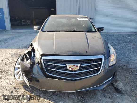 2015 Cadillac ATS Standard AWD z VIN 1G6AG1RX6F0123027, wystawiony jako Copart lot #75849154 z przebiegiem 40 857 mil mil oraz Szkoda całkowita • Salvage title. Historia ofert i sprzedaży dostępna na DreamBid. Obrazek 5.