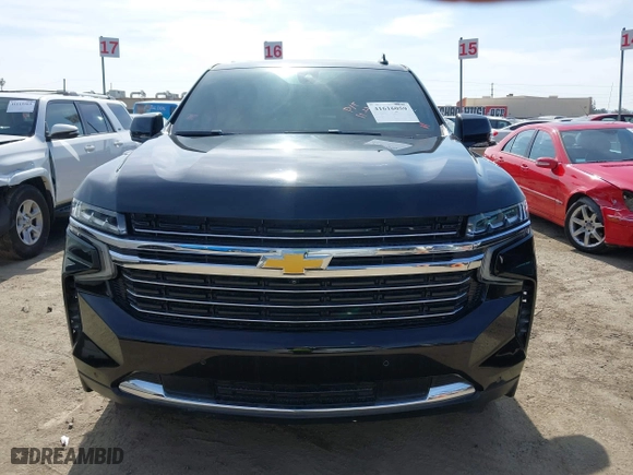 2021 Chevrolet Suburban LT with VIN 1GNSCCKD8MR146950, listed as a IAAI auction lot 41616059 with 155,060 mi miles. Bid and sale history available at carsss.com. Image 12.