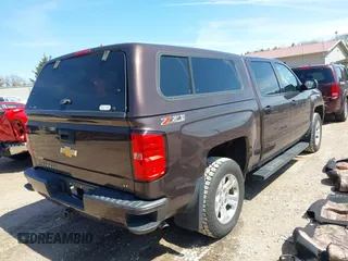 2016 Chevrolet Silverado 1500 LT with VIN 3GCUKREC3GG305792, listed as a IAAI auction lot 42083847 with 72,325 mi miles and . Bid and sale history available at DreamBid. Image 4.