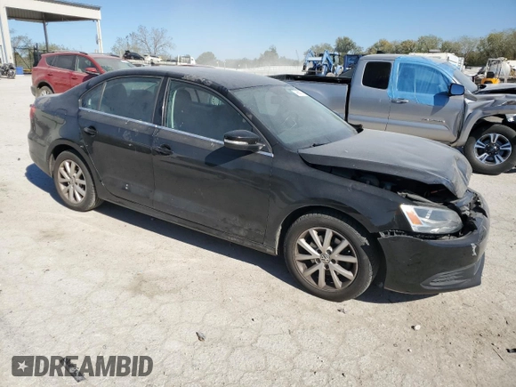 2013 Volkswagen Jetta SE with VIN 3VWDX7AJ0DM269550, listed as a Copart auction lot 74886184 with 130,181 mi miles and Salvage title. Bid and sale history available at DreamBid. Image 4.