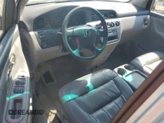 2004 Honda Odyssey EX-L with VIN 5FNRL18974B074613, listed as a Copart auction lot 48924865 with 212,633 mi miles and Salvage Title. Bid and sale history available at DreamBid. Image 8.