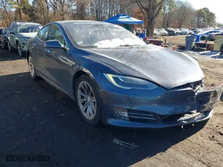 2016 Tesla Model S 70 kWh Battery with VIN 5YJSA1E12GF160955, listed as a IAAI auction lot 41351061 with 100,940 mi miles. Bid and sale history available at carsss.com. Image 1.