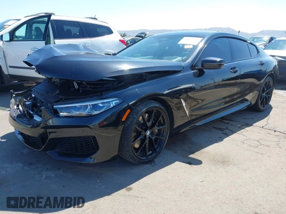 2022 BMW 8 Series 840i with VIN WBAGV2C06NCH71589, listed as a IAAI auction lot 41852263 with Not Provided miles and . Bid and sale history available at carsss.com. Image 17.