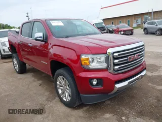 2019 GMC Canyon 2WD SLT z VIN 1GTG5DEN2K1262921, wystawiony jako IAAI lot #42331952 z przebiegiem 103 229 mil mil oraz . Historia ofert i sprzedaży dostępna na DreamBid. Obrazek 1.