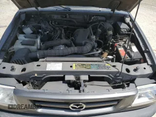 2005 Mazda B-Series Truck z VIN 4F4YR46U85PM05409, wystawiony jako Copart lot #58820575 z przebiegiem 127 258 mil mil oraz Szkoda całkowita • Salvage title. Historia ofert i sprzedaży dostępna na DreamBid. Obrazek 11.