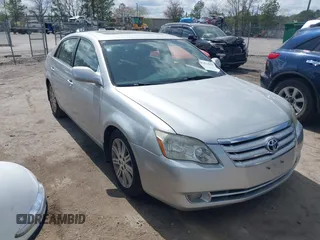 2005 Toyota Avalon XL with VIN 4T1BK36BX5U051434, listed as a IAAI auction lot 41914519 with 300,232 mi miles and . Bid and sale history available at DreamBid. Image 1.