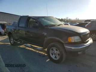 2003 Ford F-150 XLT with VIN 1FTRW08623KD45425, listed as a Copart auction lot 77605404 with 174,369 mi miles and Salvage Title. Bid and sale history available at carsss.com. Image 4.