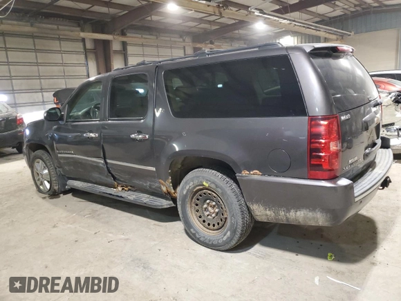2010 Chevrolet Suburban LTZ with VIN 1GNUKKE3XAR244933, listed as a Copart auction lot 85247514 with 200,732 mi miles and Salvage Title. Bid and sale history available at carsss.com. Image 2.