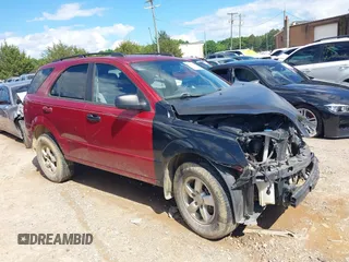2009 Kia Sorento LX with VIN KNDJD735995867602, listed as a IAAI auction lot 39432833 with 115,147 mi miles. Bid and sale history available at carsss.com. Image 1.