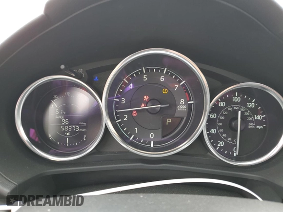 2021 Mazda MX-5 Miata Sport с VIN JM1NDAB78M0454772, выставлен на аукционе Copart как лот 63319665 с пробегом 58 373 миль миль и Списание • Salvage title. История ставок и продаж доступна на DreamBid. Изображение 9.