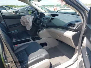 2014 Honda CR-V LX with VIN 5J6RM3H32EL000268, listed as a IAAI auction lot 42128695 with 134,335 mi miles. Bid and sale history available at carsss.com. Image 5.